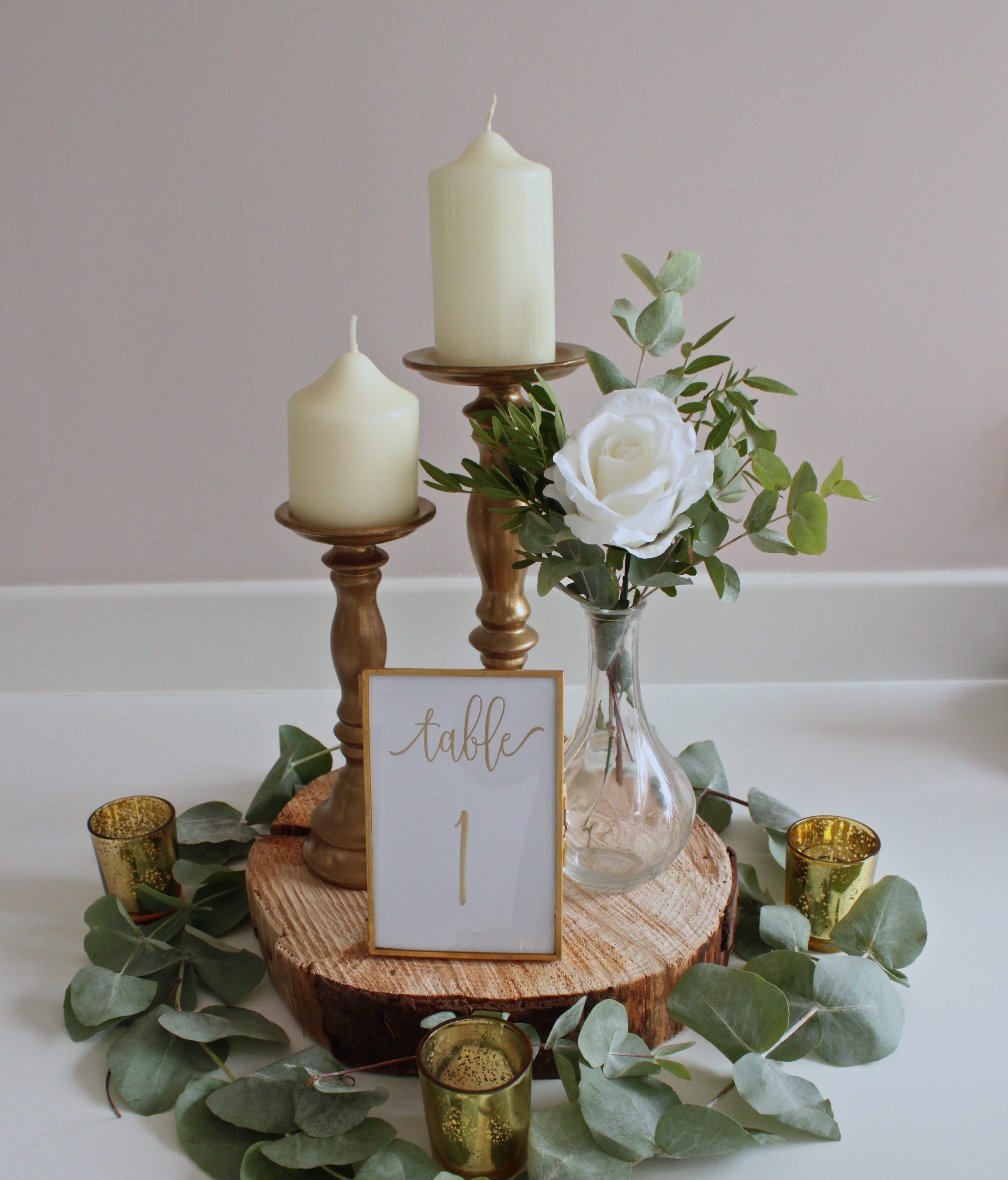 The white wedding company / wedding decor styling / candle centrepiece